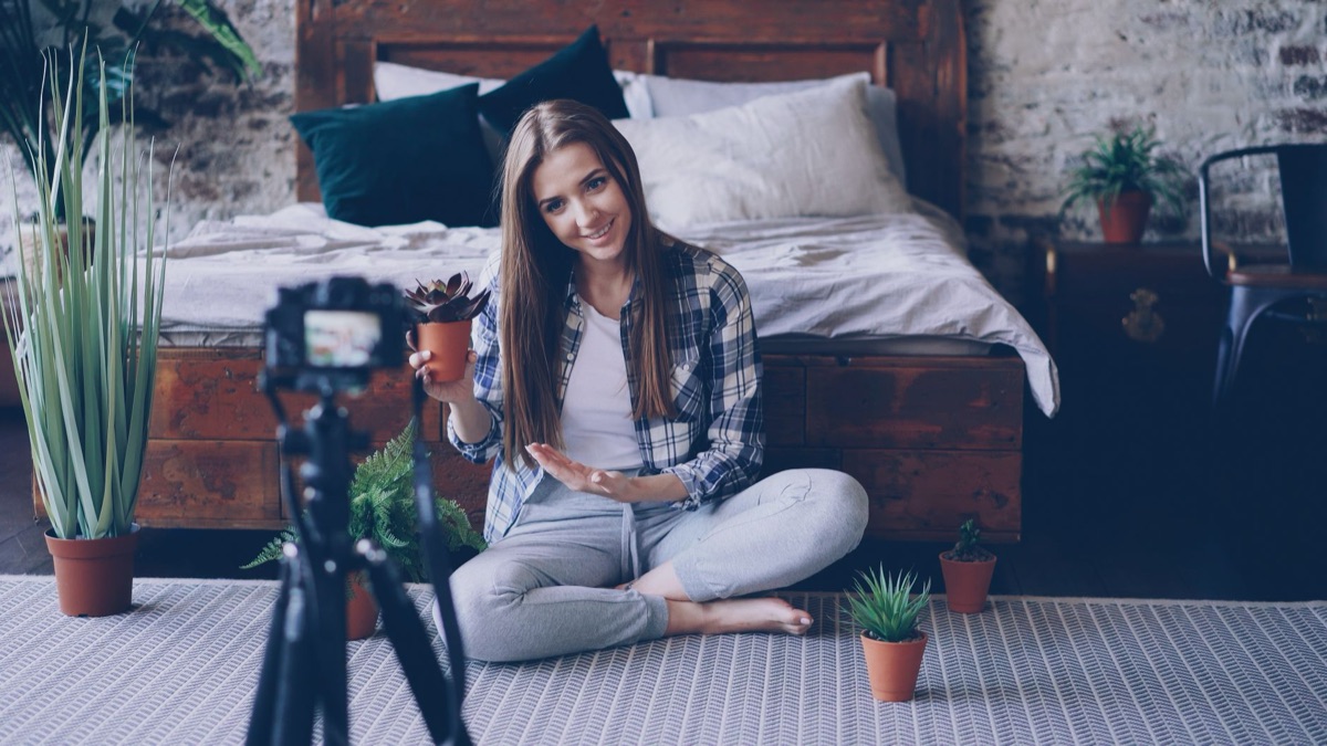Indonesian Youtuber with laptop and camera
