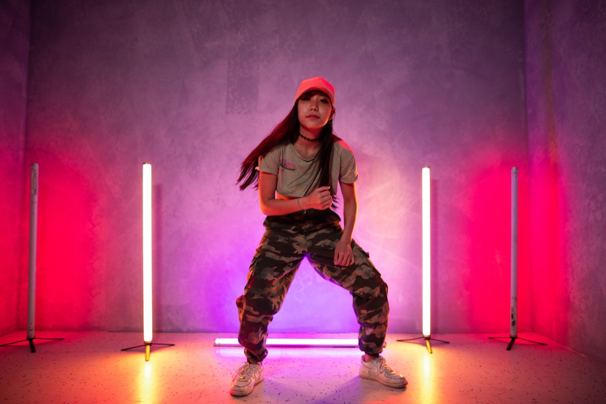 Indonesian youth dancing in streetwear during dance challenge trend