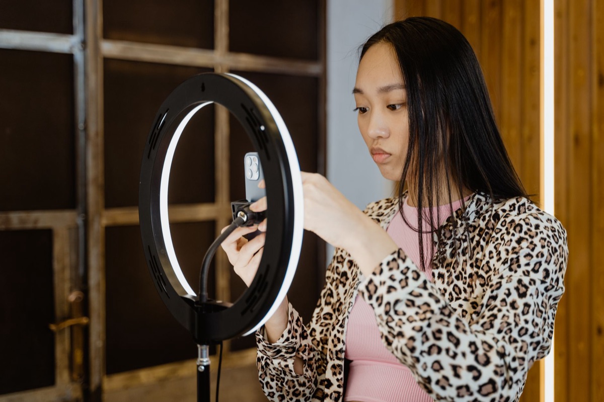 Indonesian Influencer with Smartphone