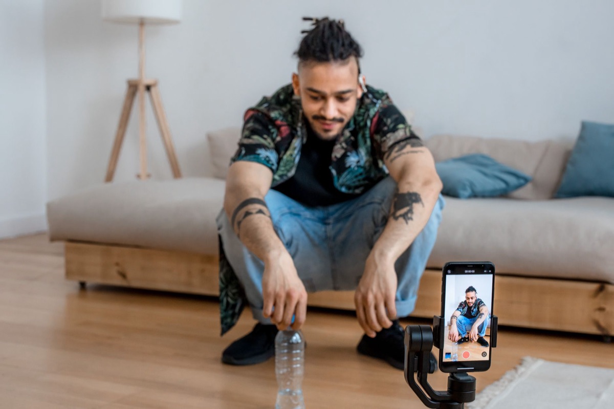 influencer filming on smartphone