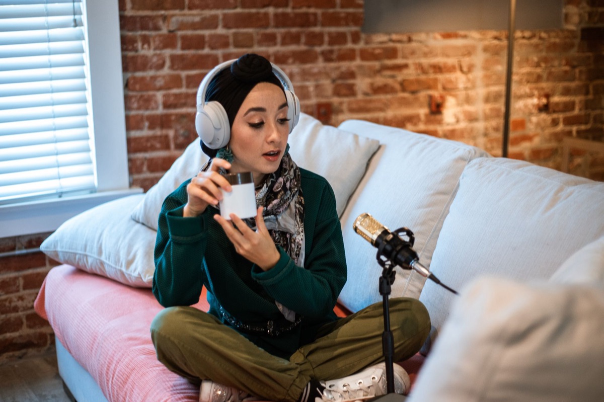Influencer using microphone for live stream